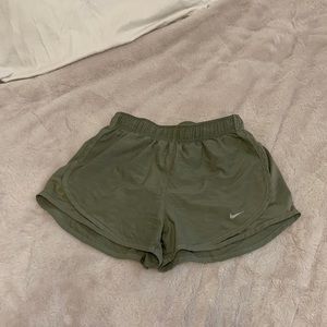 Light army green dri-fit Nike shorts with inside liner and adjustable waistband.